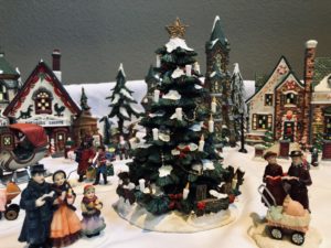 Pamela Lutrell shows her Christmas village