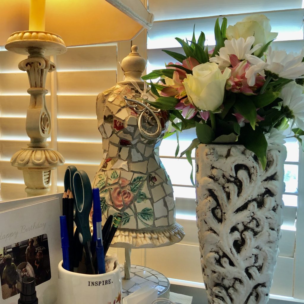 Flowers on desk of Pamela Lutrell