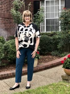 Pamela Lutrell in black & white artistic top from Chicos