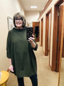 Pamela Lutrell in Olive green tunic by IC Collection