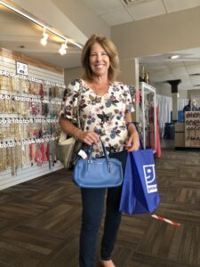 Leigh Ann with Coach Purse from Goodwill Accents