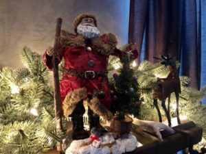 Vintage Santa on the mantel on over 50 feeling 40